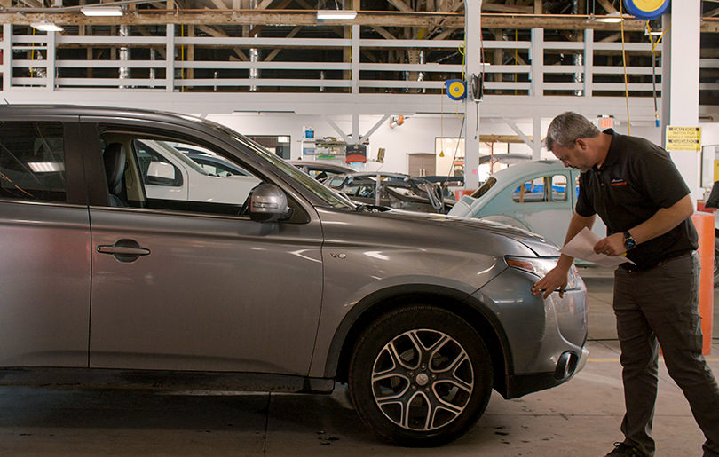 a vehicle being inspected for damage